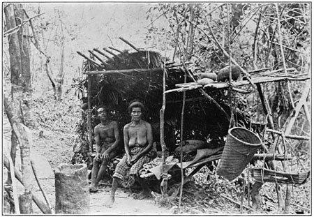 Negrito man, wife, and hut, Bataan.